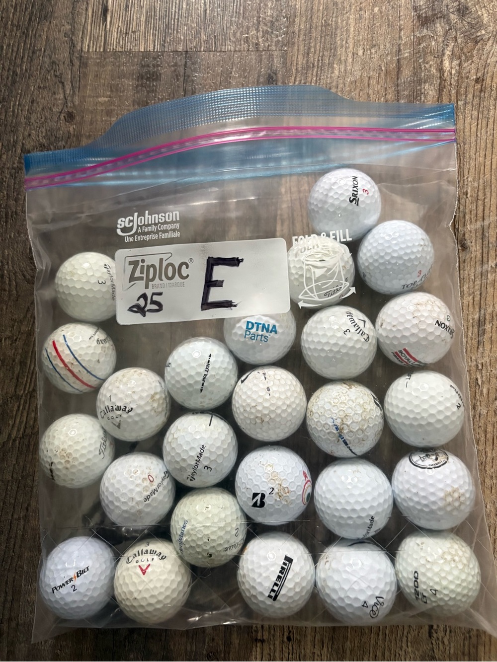 Assortment of 25 of ‘Experienced’ White Golf Balls -  Bag ‘E’.